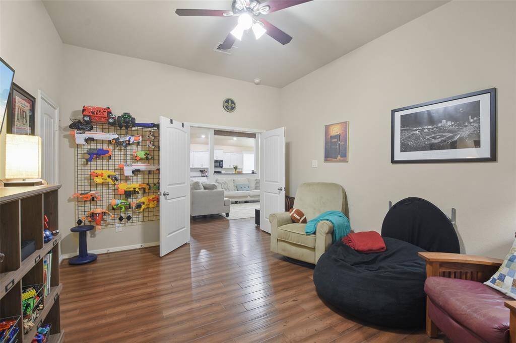 View from bonus room into den