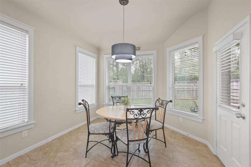 Cozy breakfast area with custom molding around the windows