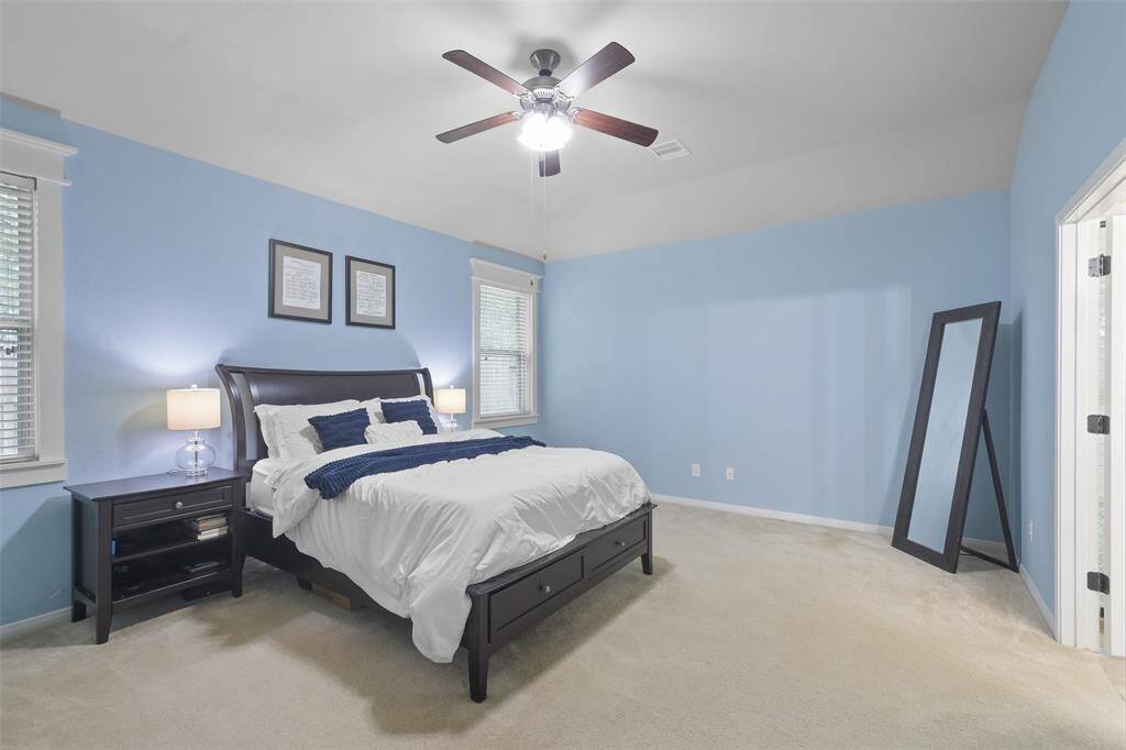 Large primary suite located at the back of the home