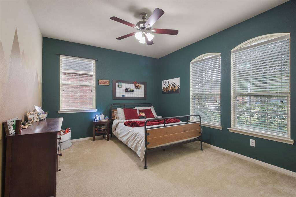 Secondary bedroom with WALK IN closet located at the front of the home