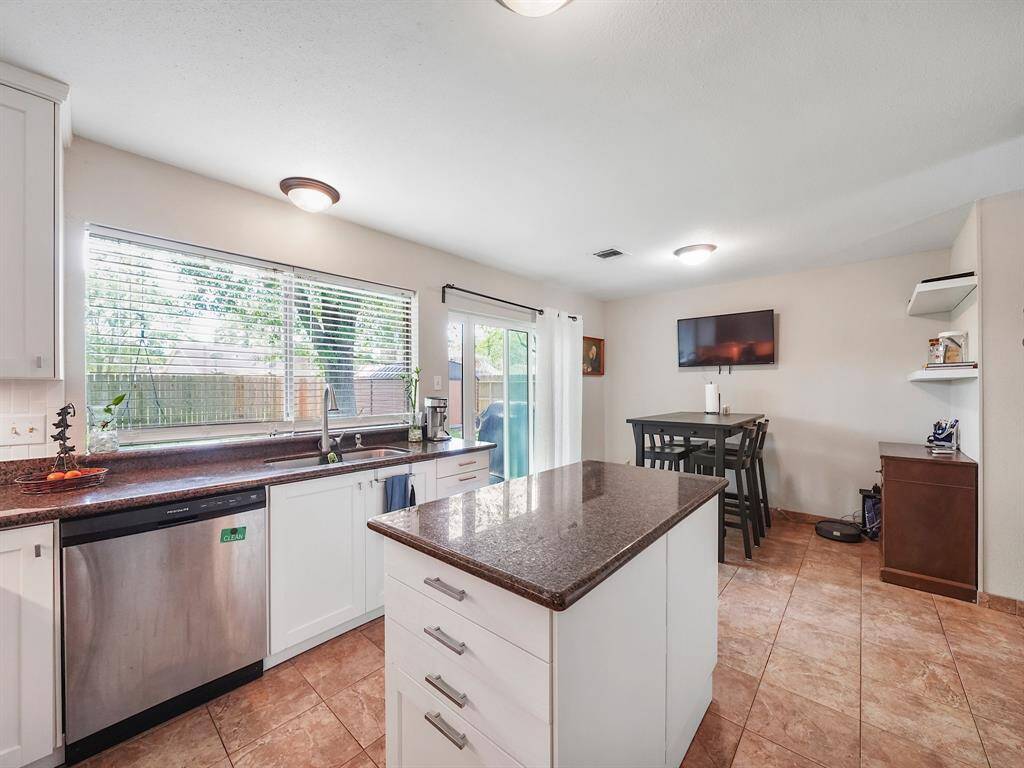 Island allows for additional storage and prep space!