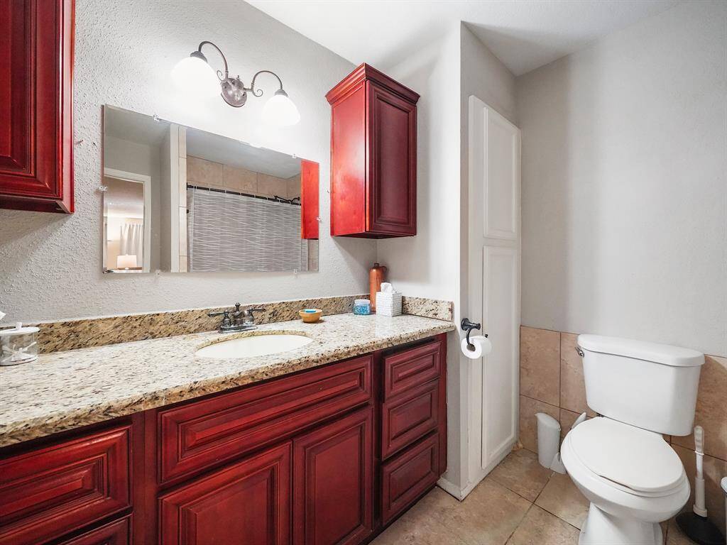 The ensuite bathroom provides a private oasis, complete with all the amenities you need to unwind and recharge.
