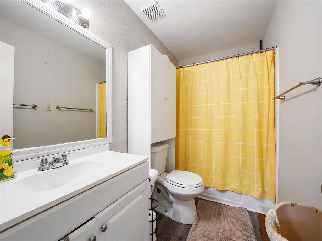 Secondary bathroom upstairs features vanity with storage and tub/shower combo!