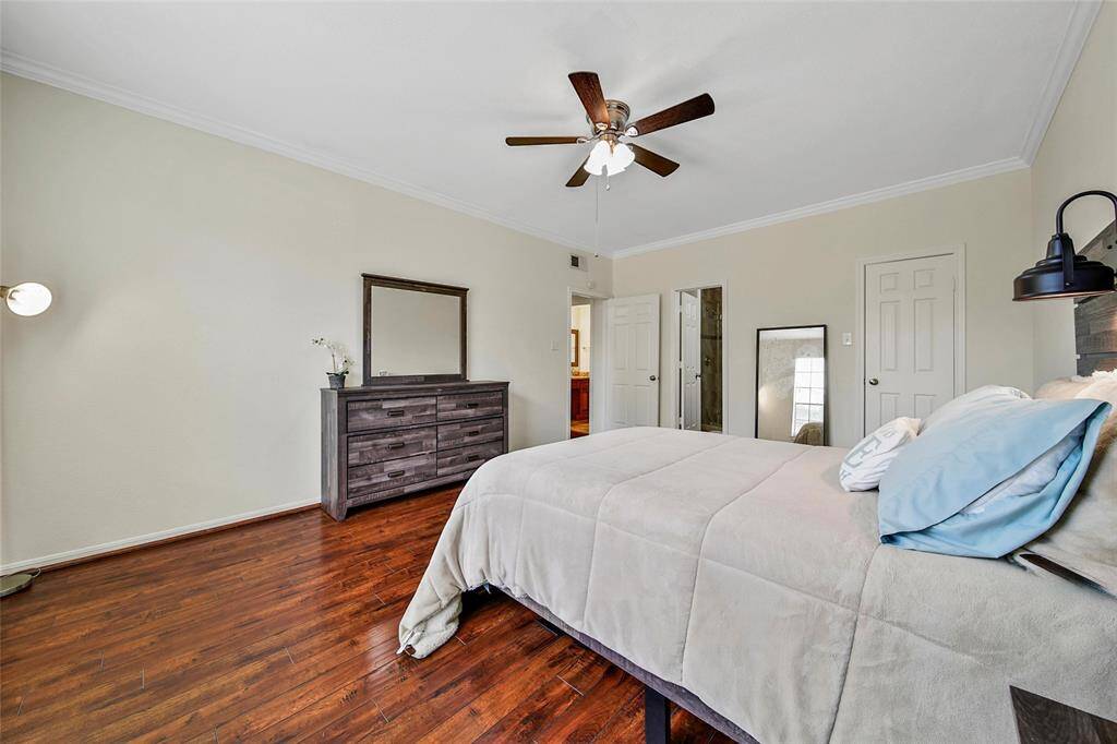 The primary suite offers a large walk-in closet and en-suite bathroom.