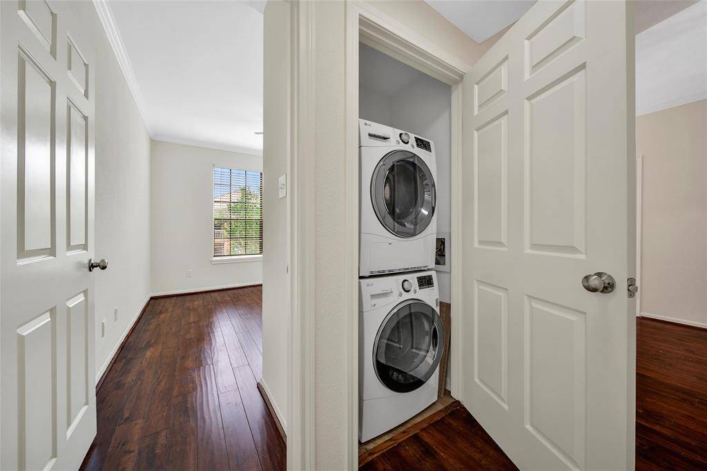The washer and dryer are located in the main hallway for ease of access while still easily staying out of sight when entertaining.