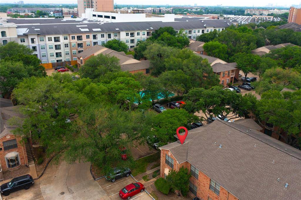 The corner location of Unit 196 allows for ample parking, great natural light & easy access to the pool which is located across the drive from the unit.