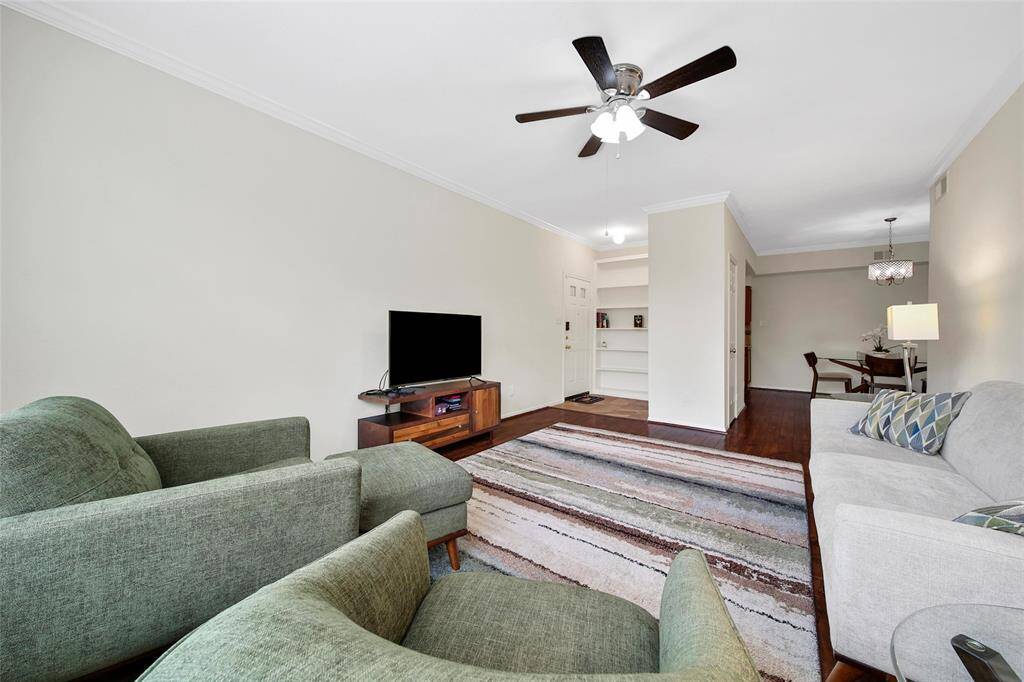 The living room opens to the dining room for seamless entertaining.