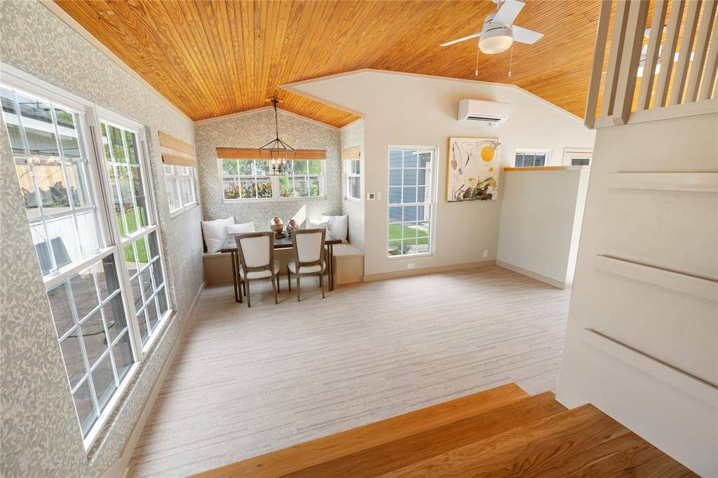 Step down to the versatile and inviting den