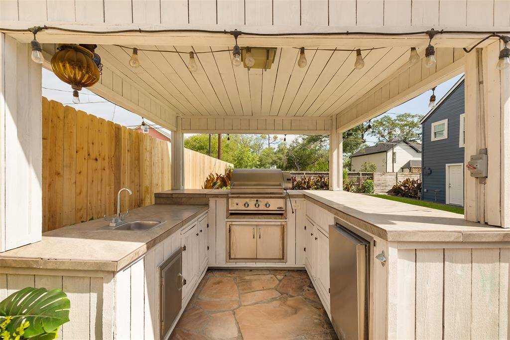 Cook for guests in this awesome outdoor kitchen