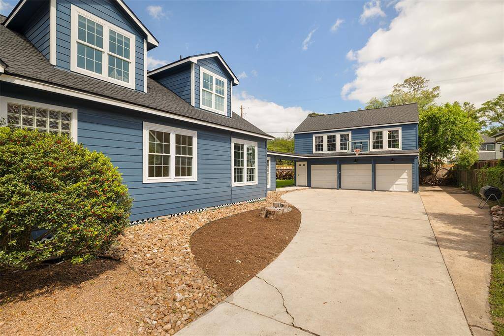 Driveway to the garage widens for additional parking