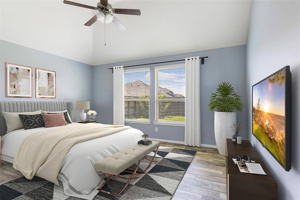 Large primary suite with vaulted ceiling (virtually staged)
