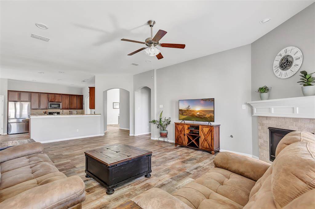 Living room with view of the kitchen and dining room