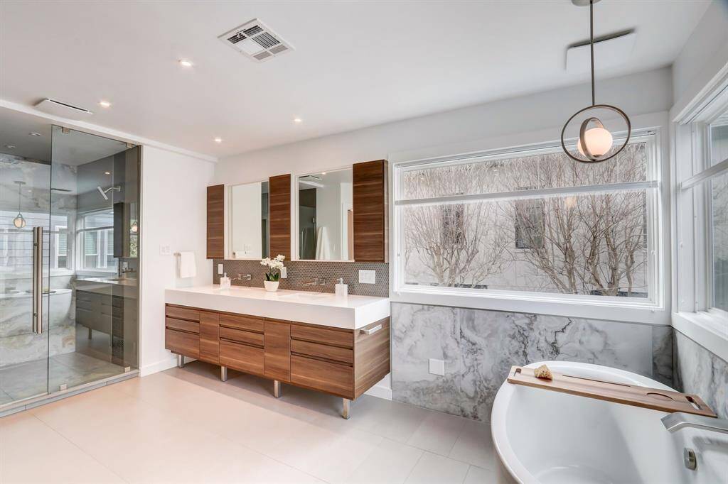 Contemporary styling throughout make this bathroom feel like you are staying at a nice boutique hotel.