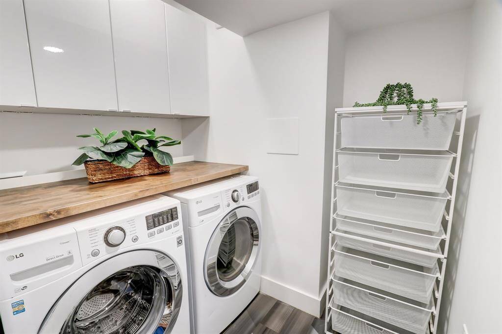 Located on the first floor, you also have built in storage as well as folding space above the washer and dryer.