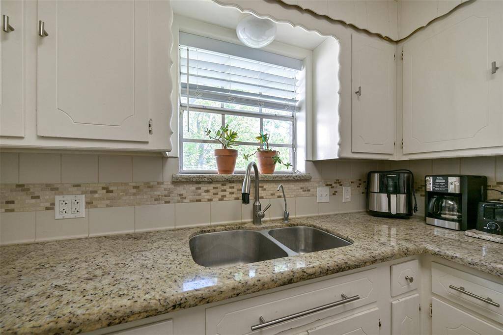 Natural light to frame the kitchen sink!