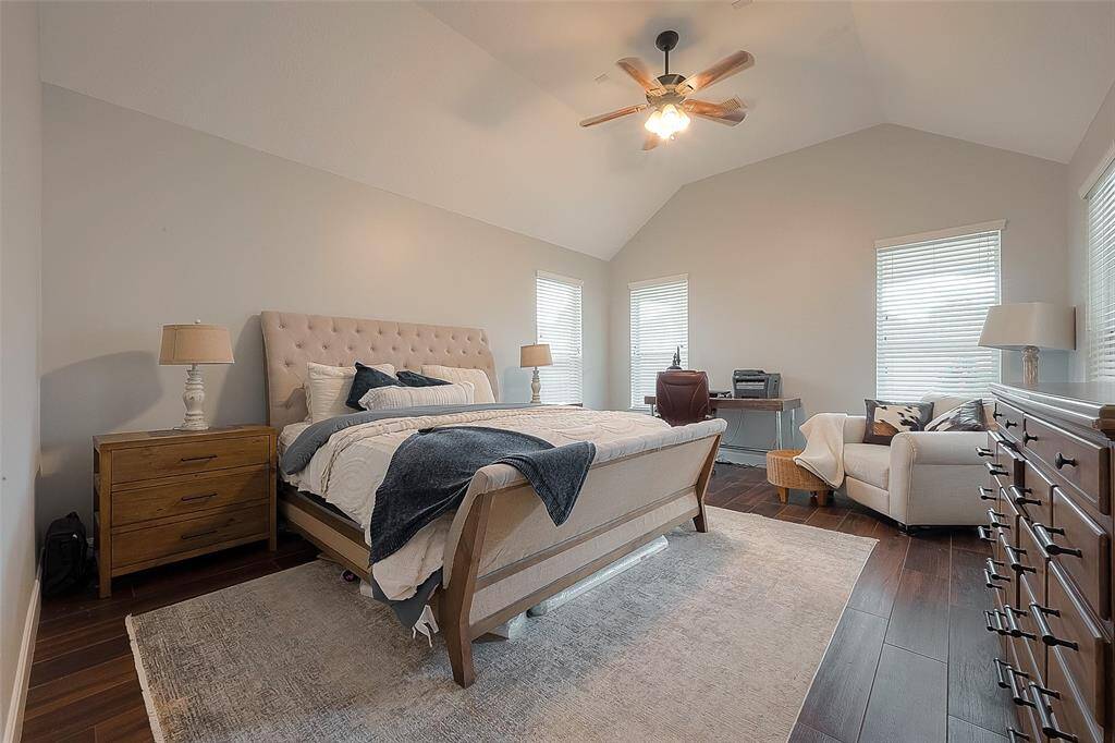 Primary bedroom is intimate, yet spacious.
