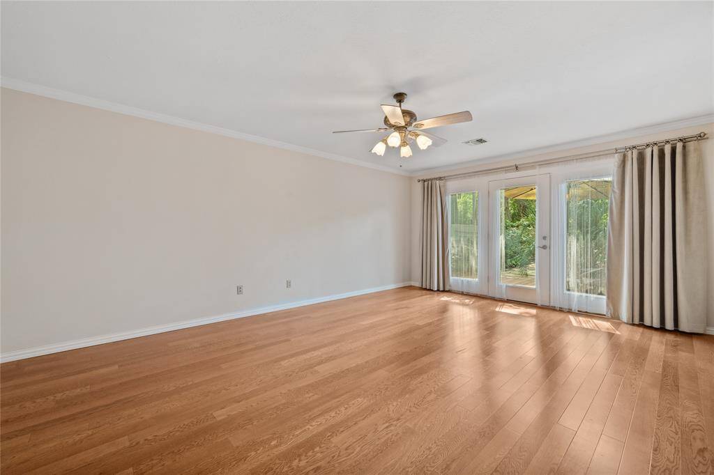 And - the HUGE Primary Bedroom! Wood Floors.... Double Pane Windows and Doors!