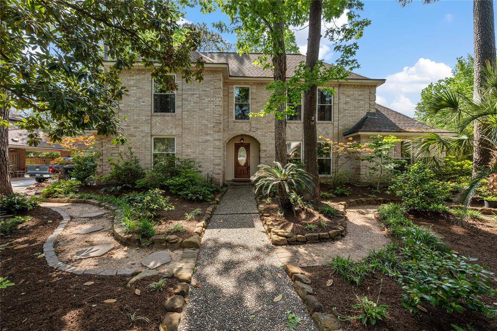 Elegant and spacious Family Home in Beautiful Fosters Mill Village... note the paths and lovely flowers...