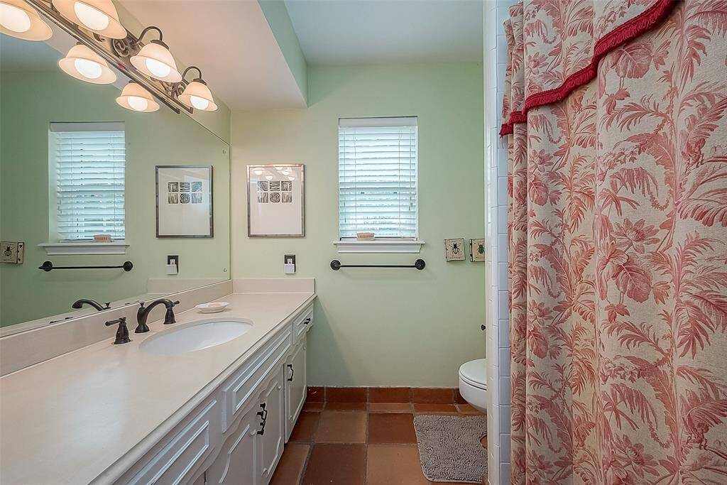 Full bathroom (not primary) with tub & shower