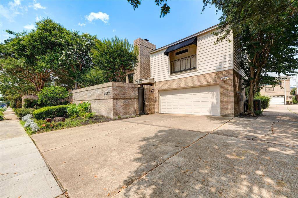 Ideal unit A, oversized lot with street and driveway parking available. Plus 2-car garage!