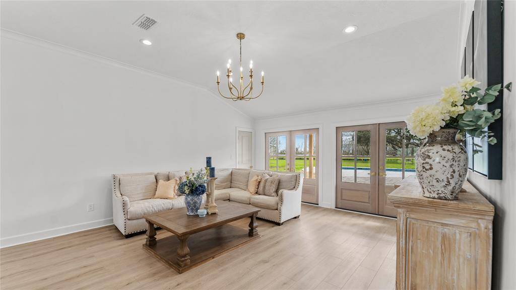 Take note of the two sets of double doors that offer a perfect blendof style, functionality, and versatility,enhancing the overall aestheticappeal of the space while providingpractical benefits such as naturallight, and seamless integration withthe outdoor area.