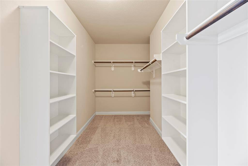 huge primary walk-in closet