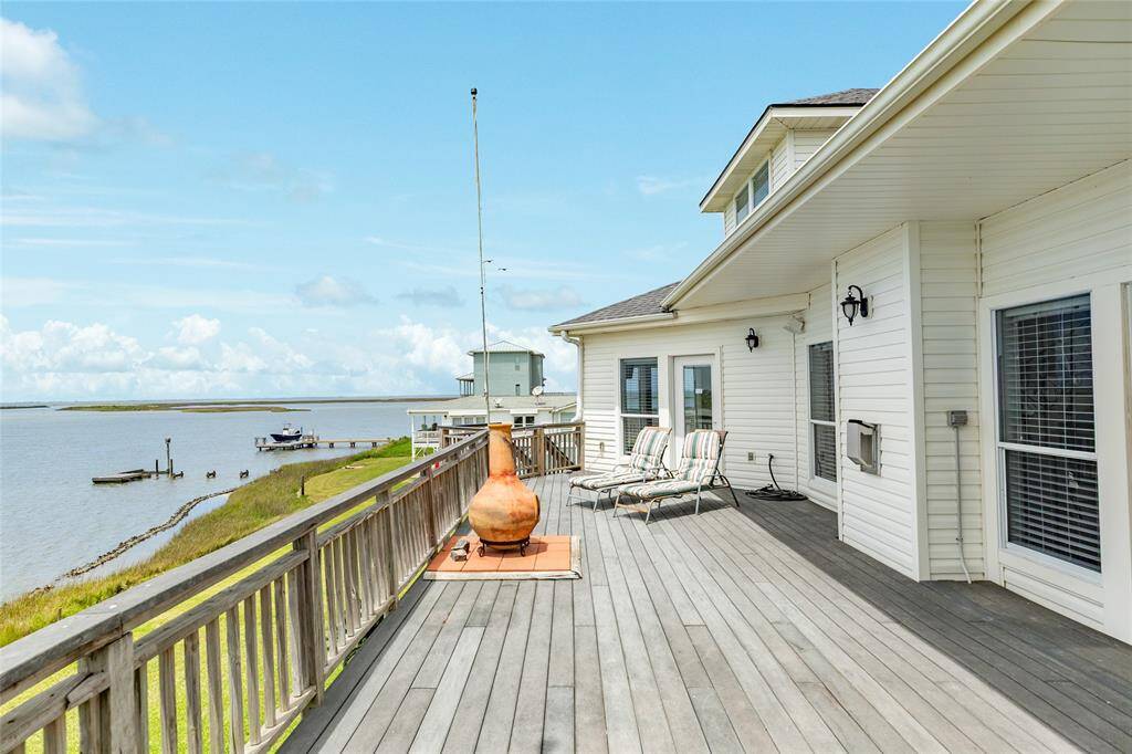 Stunnig and peaceful Back upstairs deck with additional staircase over looking the Eckert Bayou