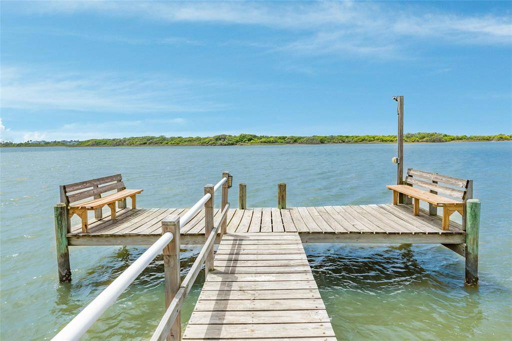 Fishing pier and sunning deck at the back of home