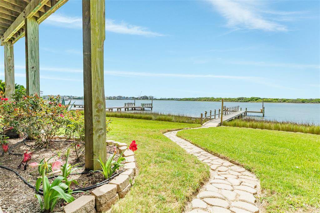 Back yard with path to the pier
