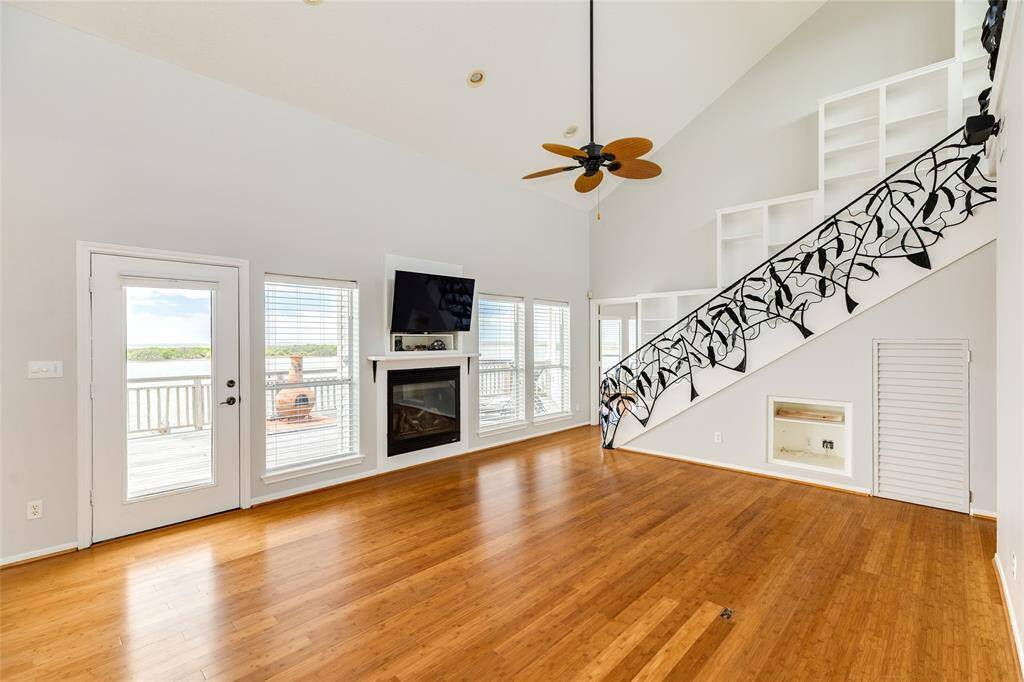 Living room and stairway leading to the flex space