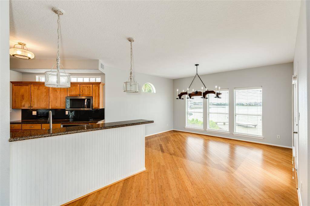 Breakfast bar dining and kitchen from living