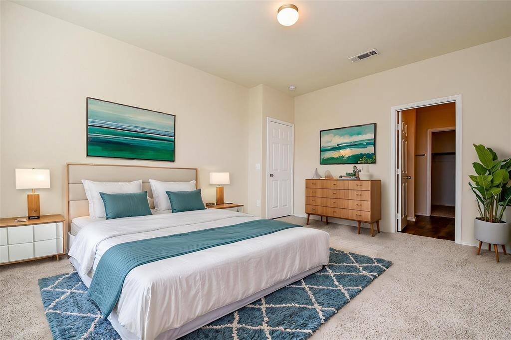 Imagine waking up to the soft natural light streaming through the large windows, creating a bright and airy atmosphere.