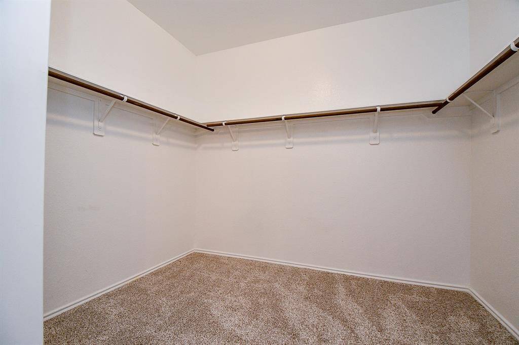 Step into this spacious walk-in closet.
