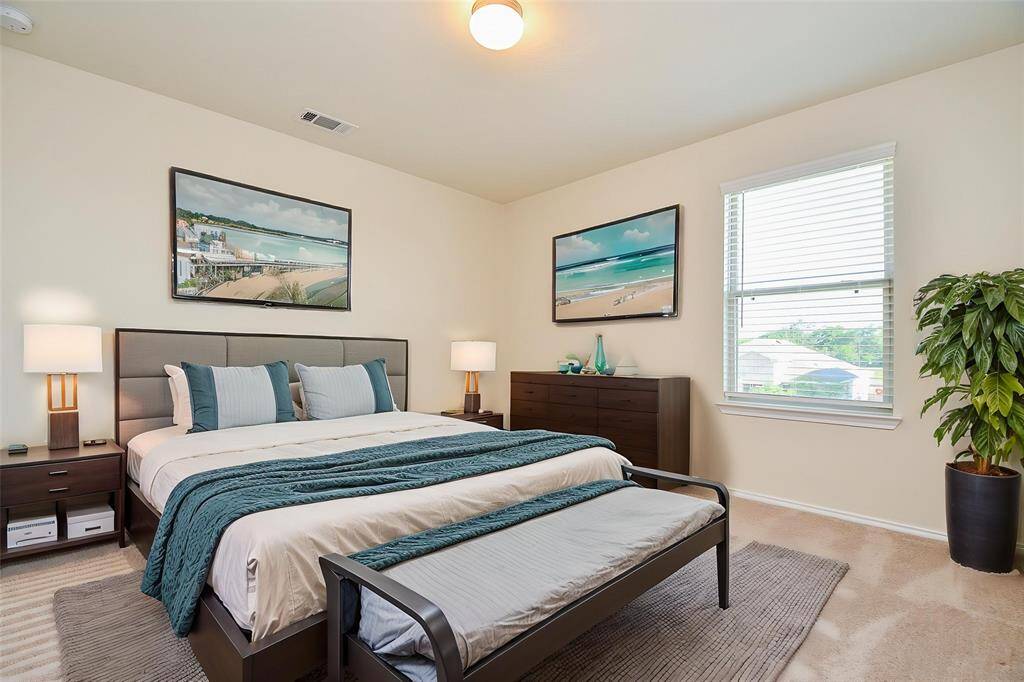 This next bedroom offers ample square footage, providing a versatile canvas to personalize and create your ideal retreat.