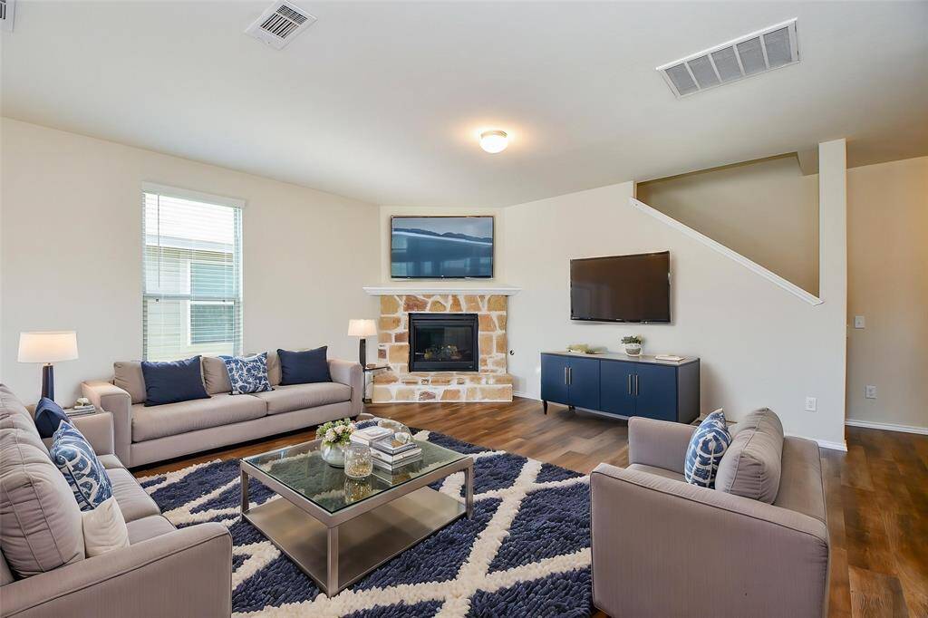 Envision relaxing in this spacious living area, the heart of your future home.