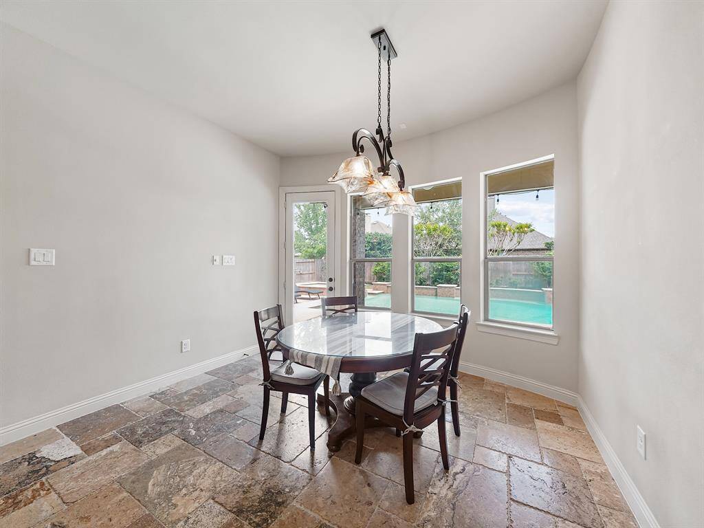 Nestled just off the kitchen, you'll find a charming breakfast area, perfect for enjoying casual meals and starting your day off right.