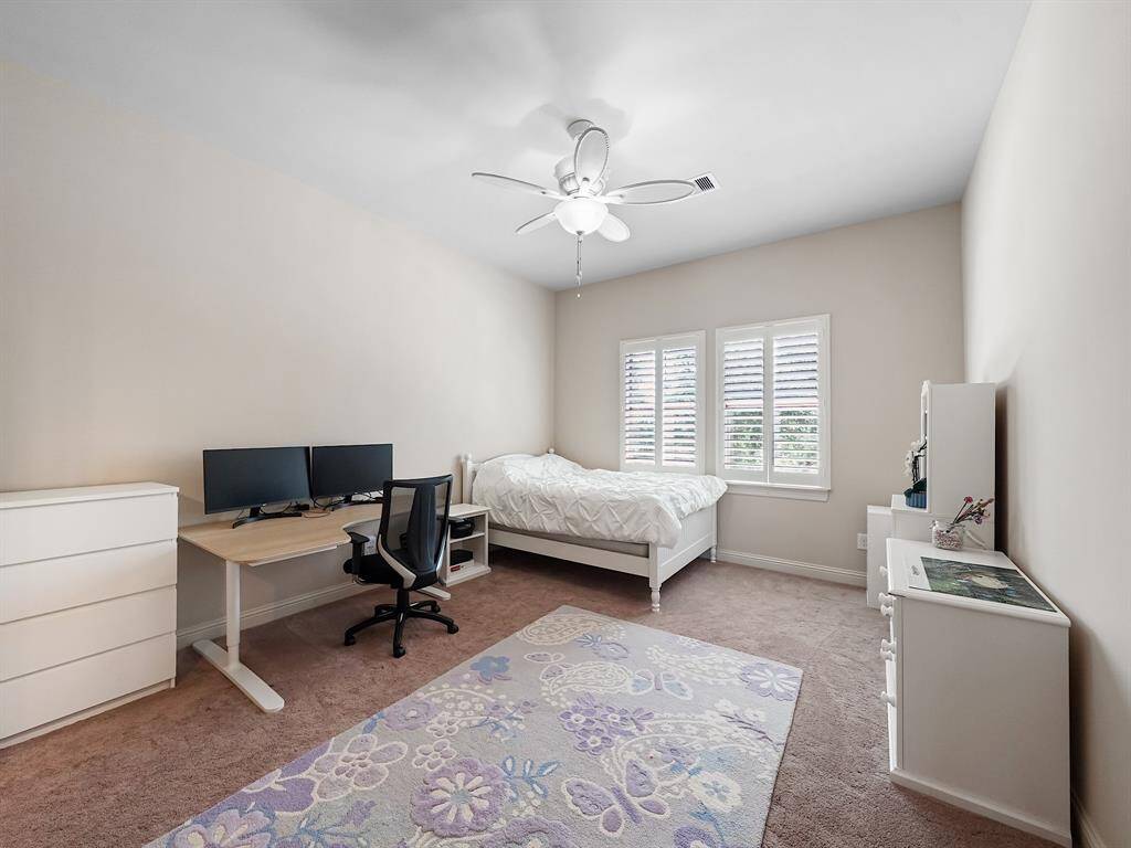 This property offers three spacious secondary bedrooms on the second floor, all equipped with ceiling fans and stylish plantation shutters. Two of these bedrooms provide the luxury and privacy of their own en suite bathrooms.