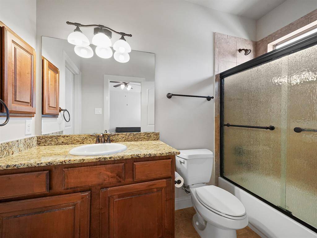 Ensuite bathroom boasts vanity, granite countertops, medicine cabinet and tub/shower combo!