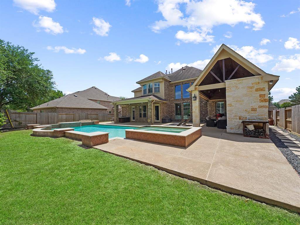 Perfect for family fun and entertaining guests, this outdoor space offers endless opportunities for relaxation and enjoyment. Make memories that will last a lifetime in this beautiful home!