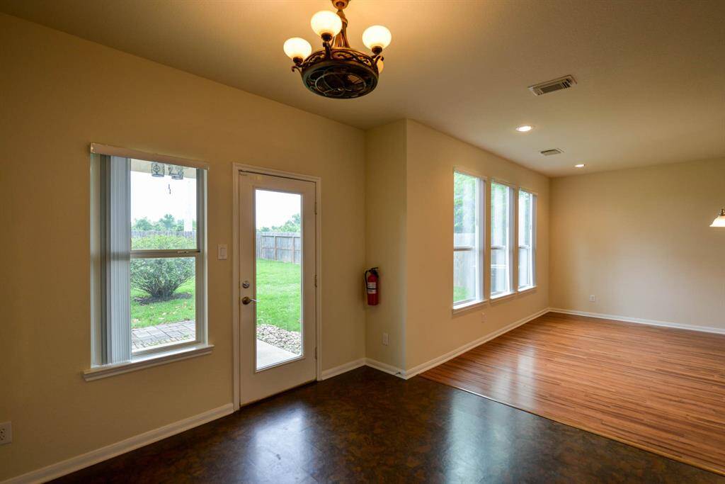Enjoy expansive backyard views from the breakfast area, kitchen, and dining room.