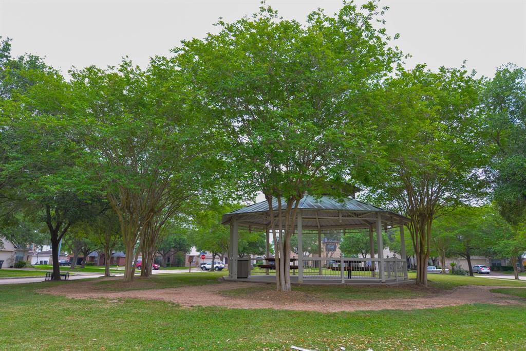 Enjoy a charming gazebo park just steps from your new home.