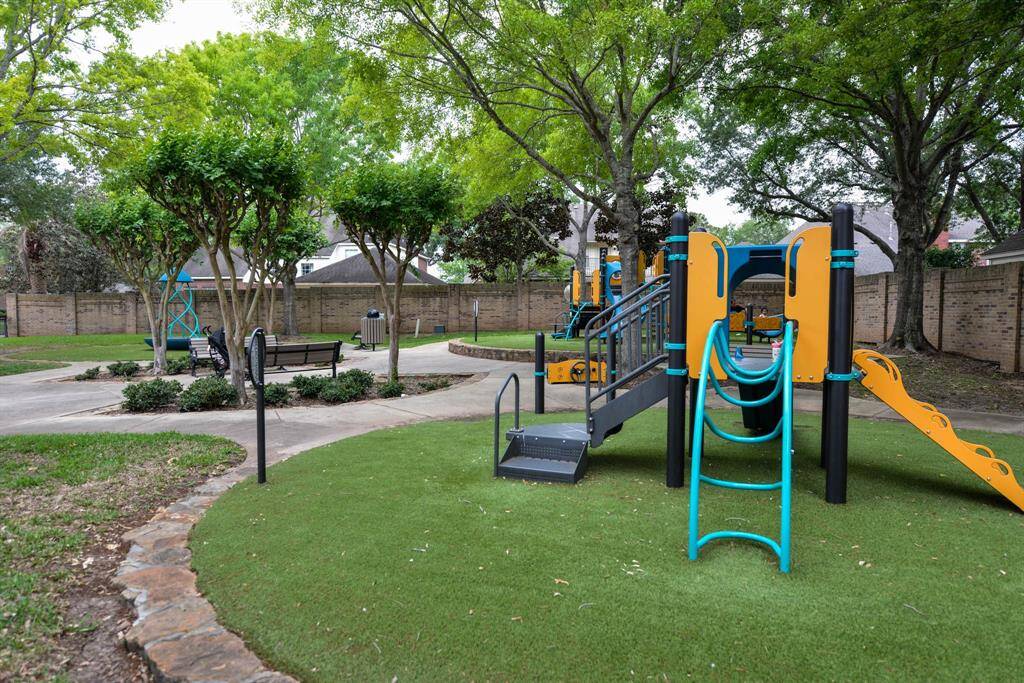 Discover the perfect family haven at River Park, featuring a vibrant playground where children can safely explore and play.