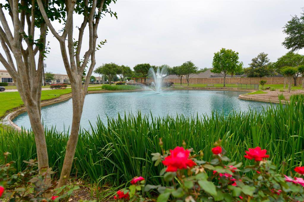Tranquil lakes and scenic walking paths enhance the neighborhood's charm.
