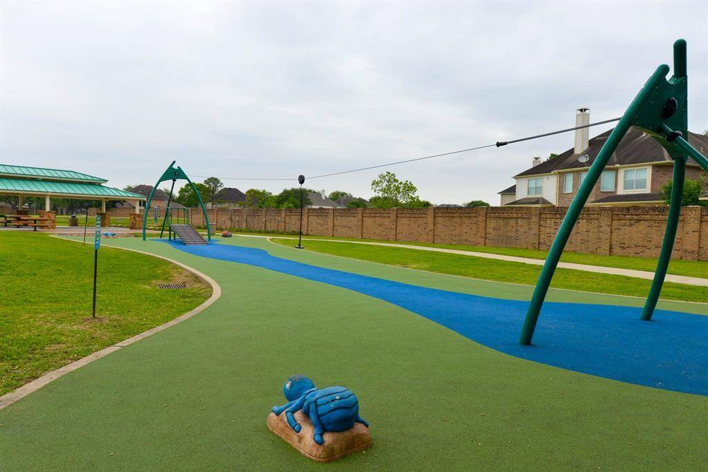 Exciting kids' zipline in a family-friendly neighborhood park, perfect for fun and adventure.