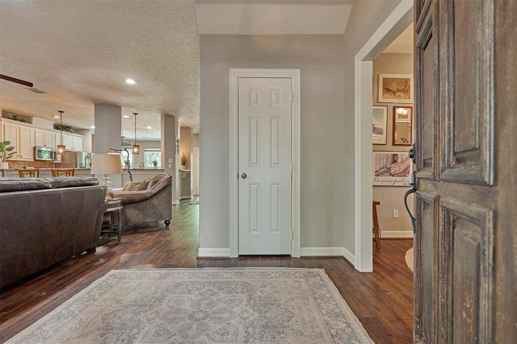 Entering the home, the living room is situated to the left and the study is on the right.