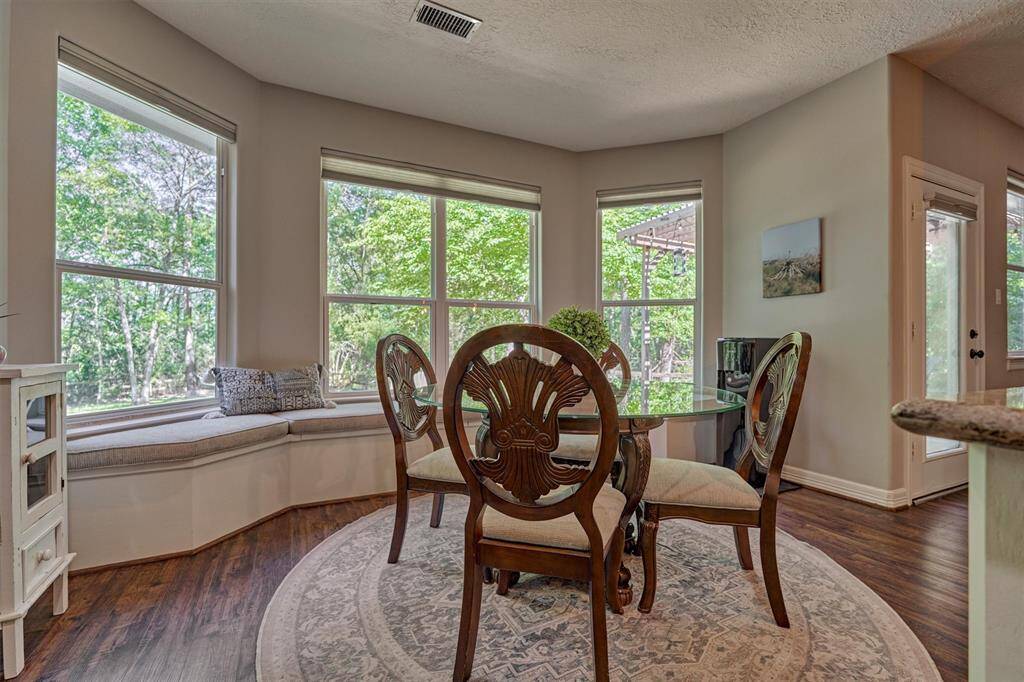 The breakfast room overlooks the serene back yard!