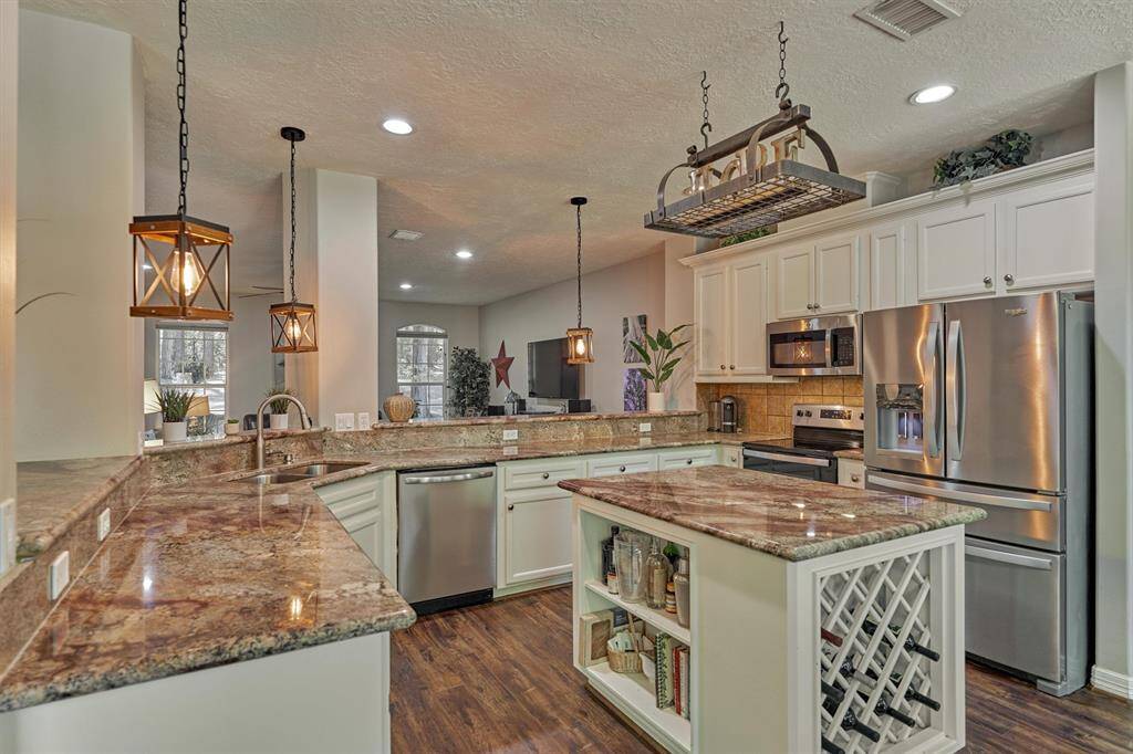 Kitchen opens to the living area.