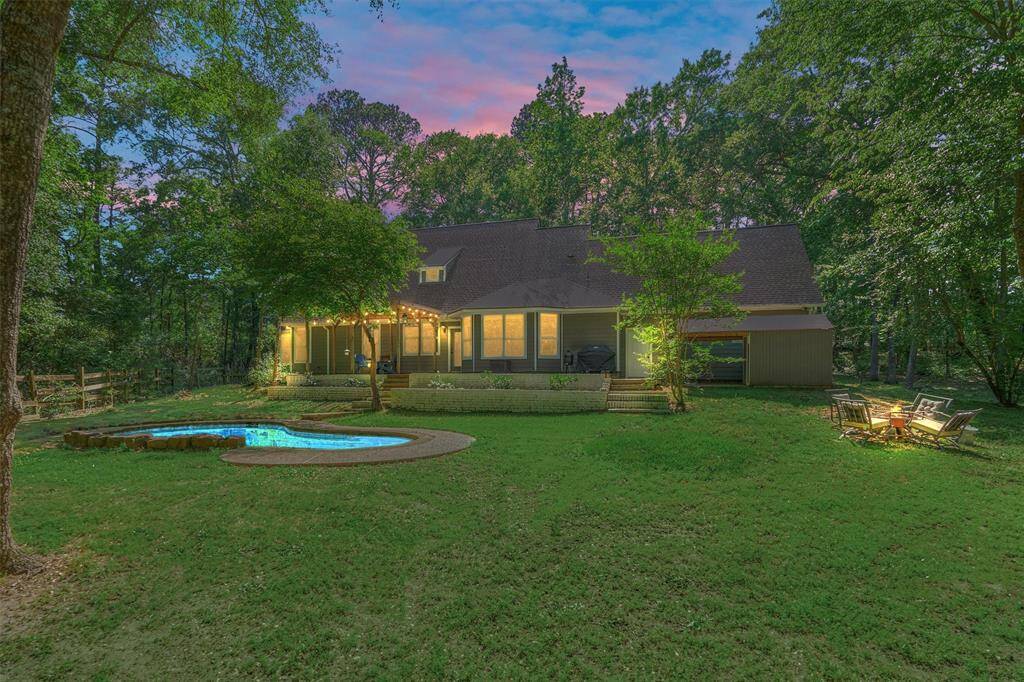 Tucked away on two unrestricted acres, but only minutes from town!