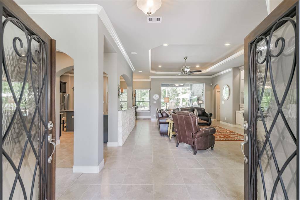 The open-concept layout flows seamlessly into the kitchen and dining areas, perfect for everyday living or entertaining. Neutral tones and quality finishes throughout make this space move-in ready and easy to personalize.