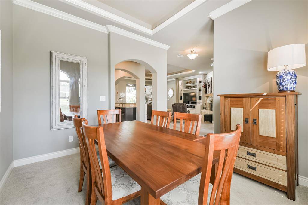 Dining room that is located just of kitchen and living area for open concept entertaining.